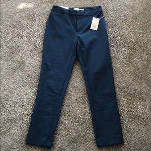 A. New day high-rise skinny dress pants size 4R